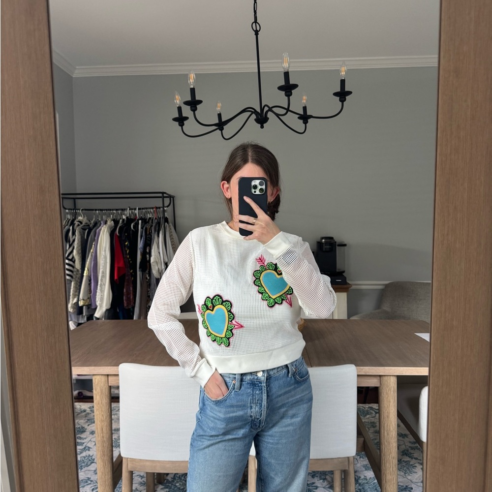 White Sweatshirt with Green Floral Accents